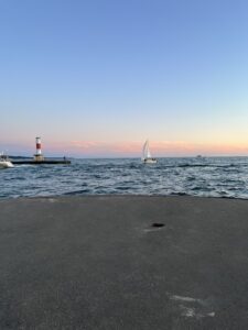 Holland Lakeshore with Sailboat and Lighthouse Lake Michigan